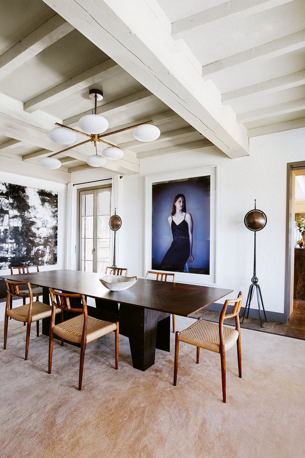 Image may contain Furniture Chair Wood Human Person Appliance Table and Hardwood