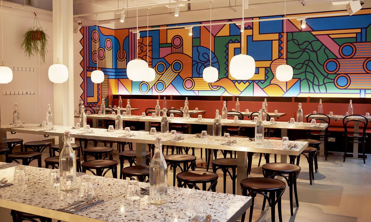 Image may contain Furniture Chair Restaurant and Cafeteria