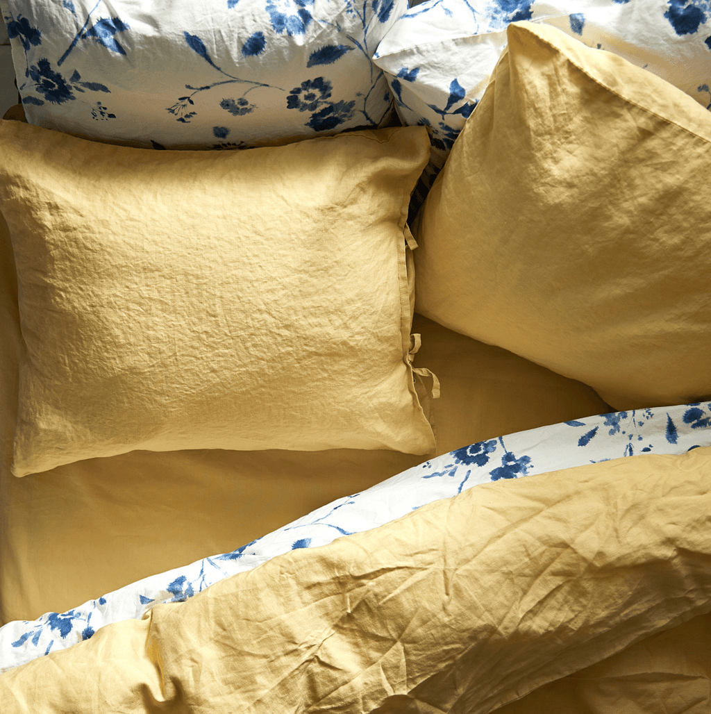 Image may contain Cushion Pillow Furniture and Bed