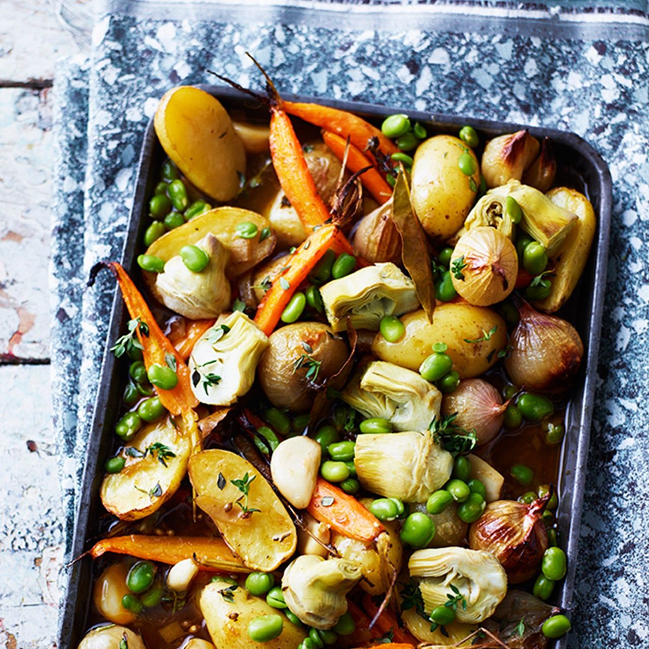 Potatoes, artichokes, carrots and broad beans with preserved lemons