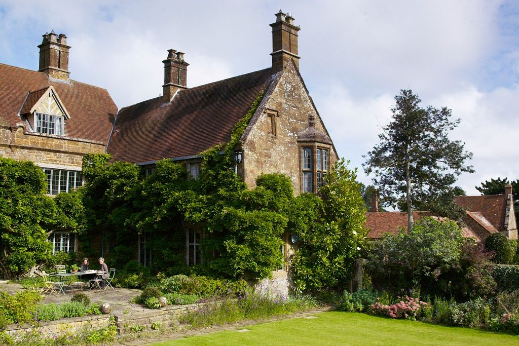 A terraced area in front of the house.
