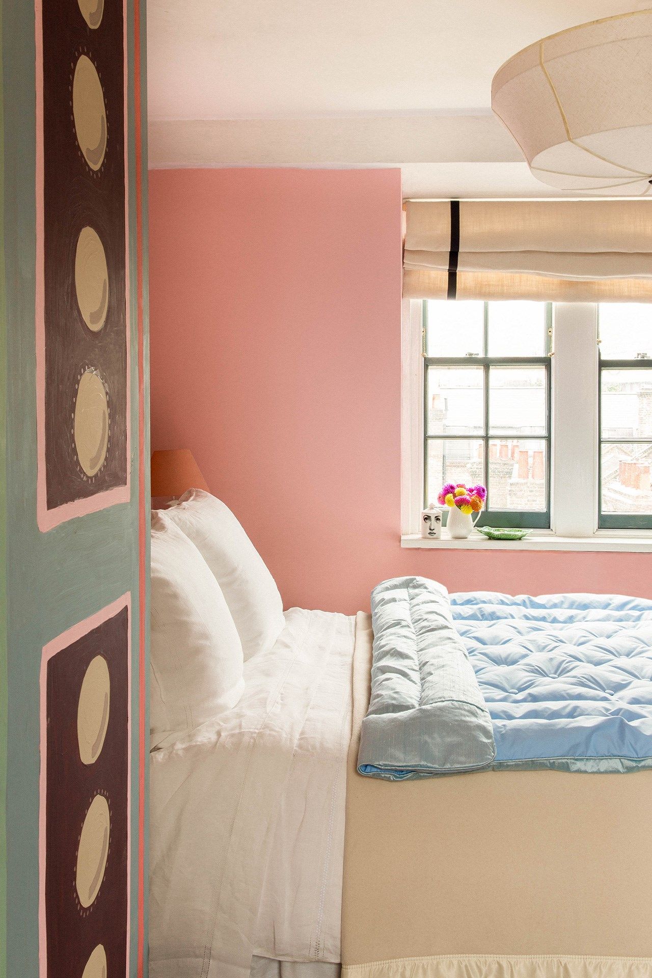 Image may contain Indoors Room Bedroom Furniture Dorm Room and Bed