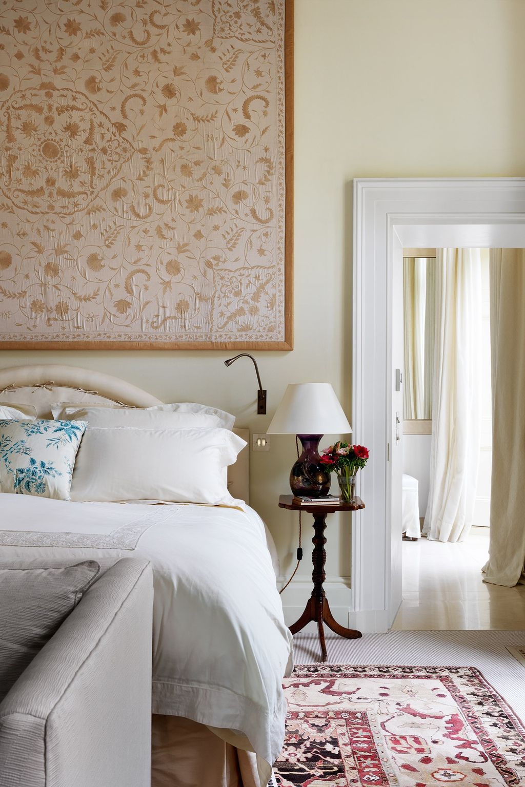 Image may contain Furniture Indoors Room Bedroom Bed Interior Design Lamp and Table Lamp