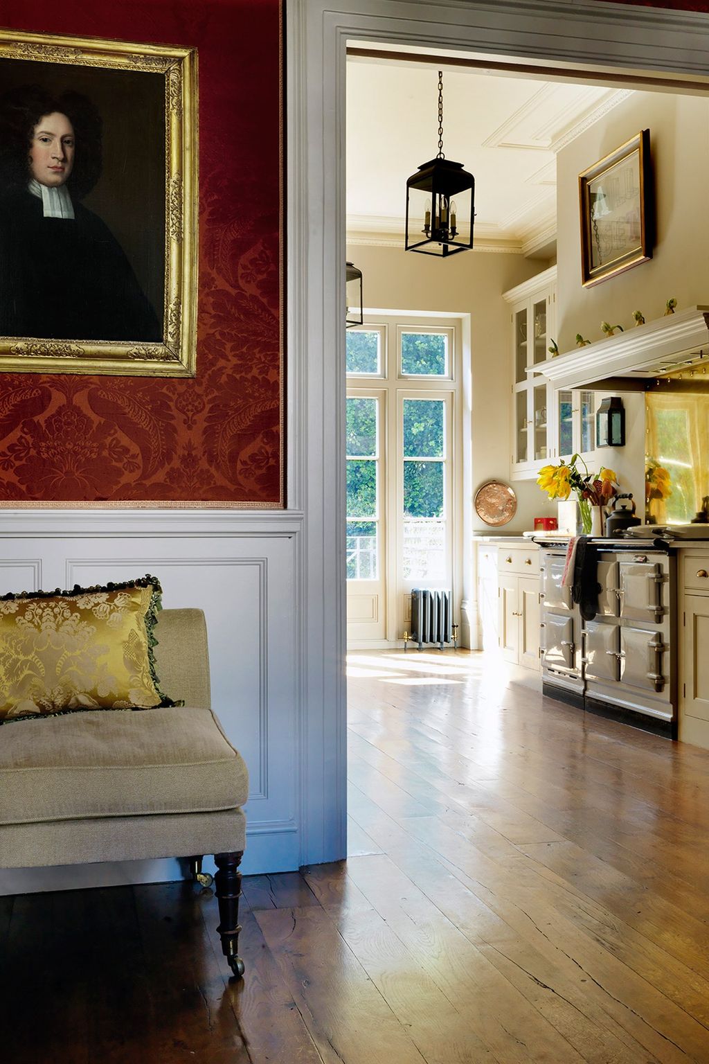 Sliding pocket doors lead from the dining room into the Englishcountrystyle kitchen which has Plain English cupboards...