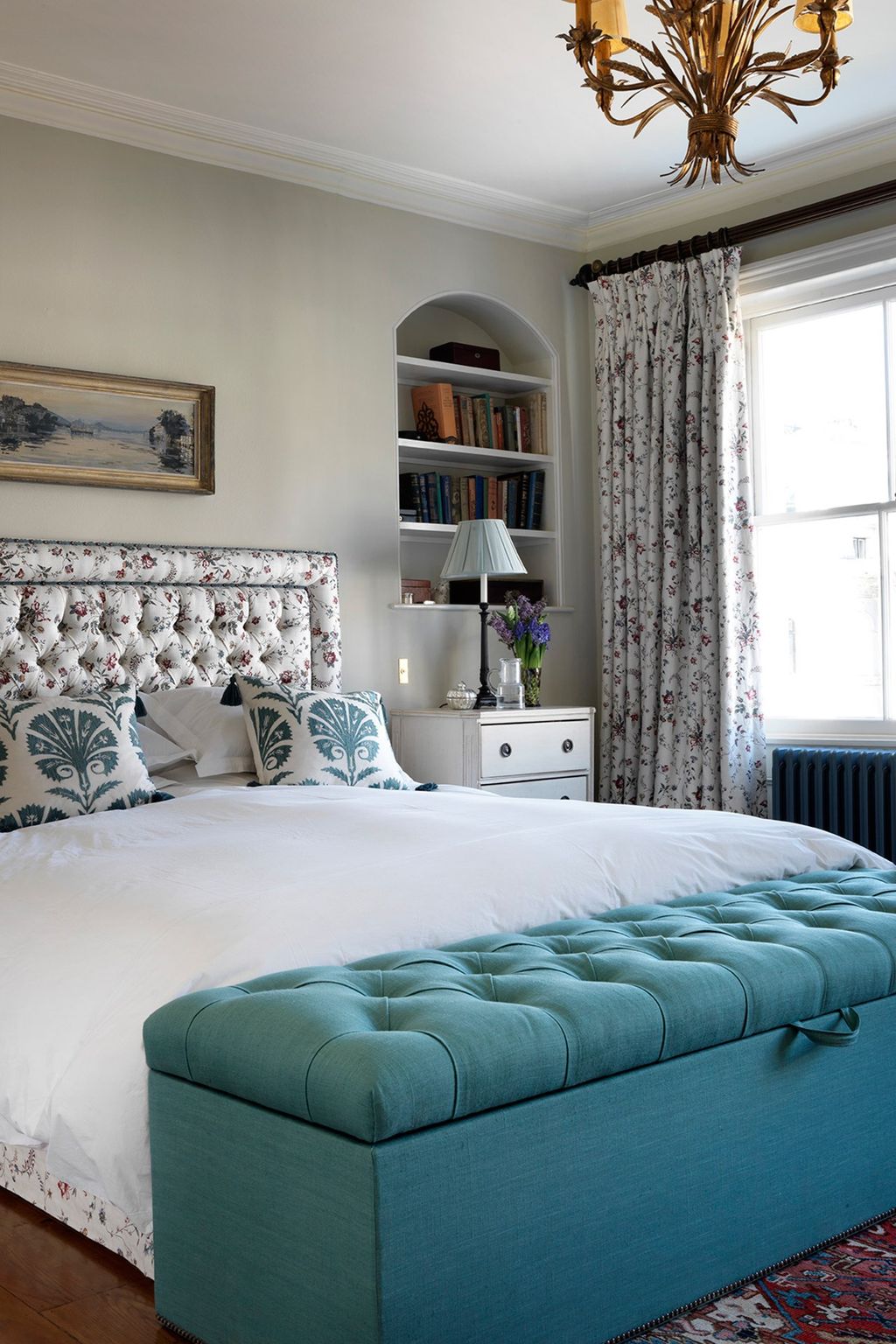 A portrait by Betsy Podlach above the Howe fireplace inspired the palette for the main bedroom.