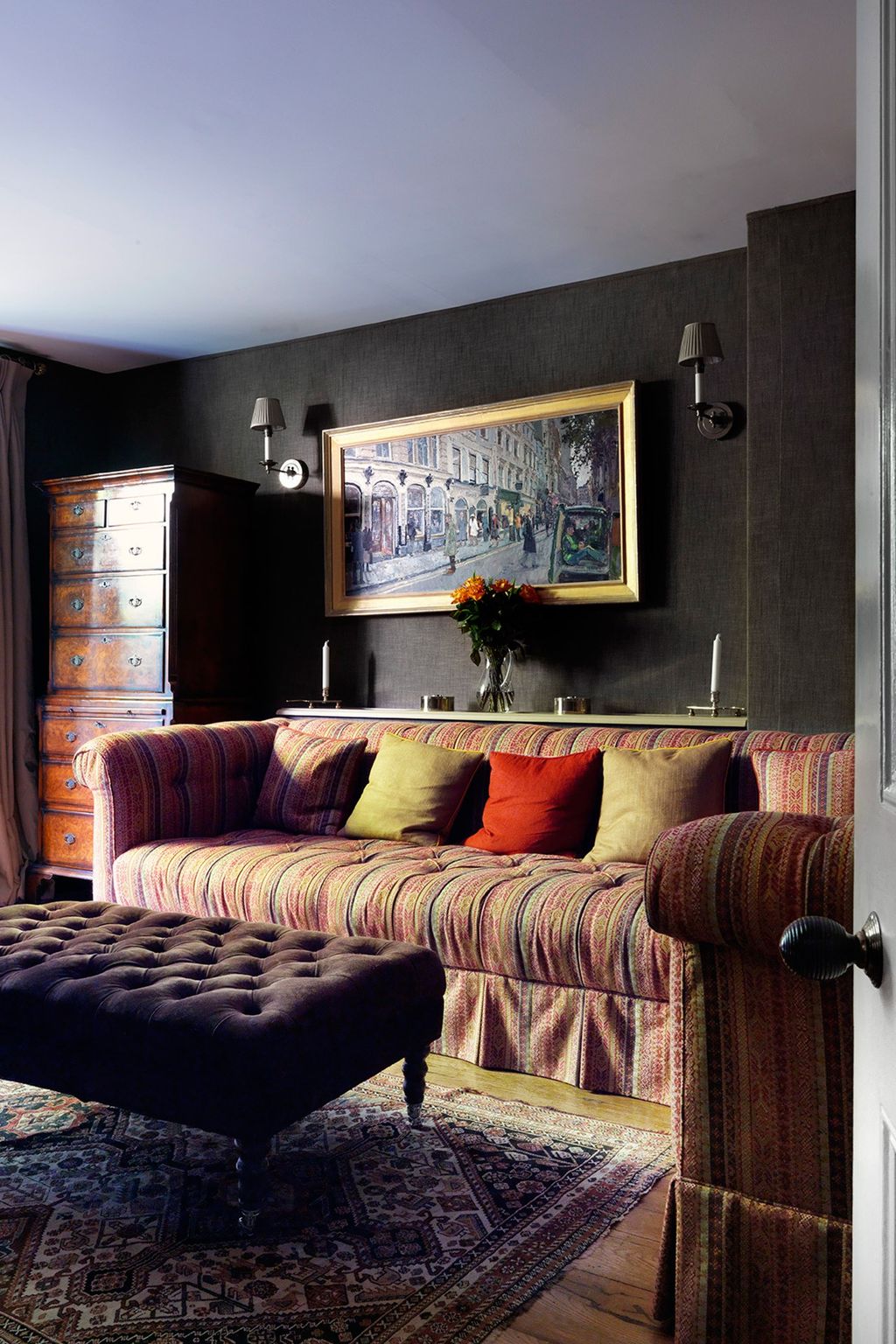 Image may contain Furniture Couch Living Room Indoors Room Interior Design and Rug