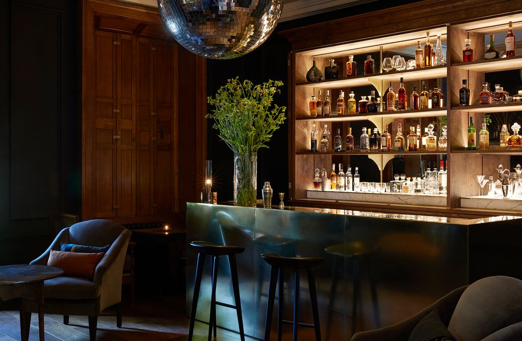 Image may contain Furniture Pub Bar Counter Chair and Sphere