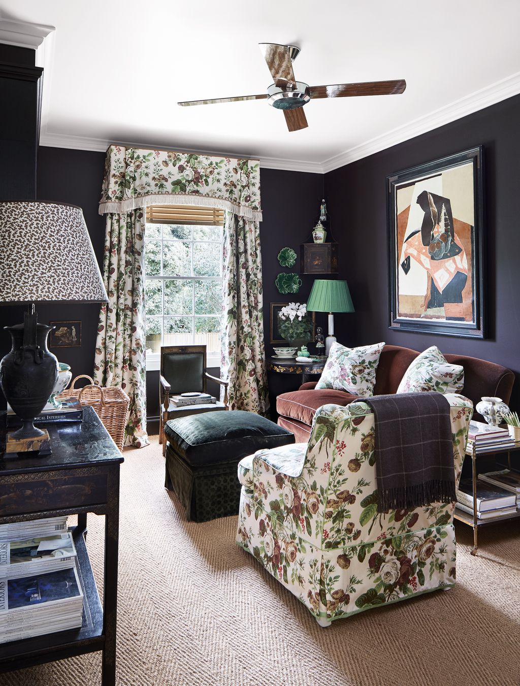 Image may contain Ceiling Fan Appliance Furniture Living Room Indoors Room Lamp and Table Lamp