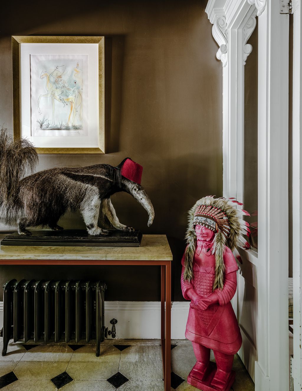 Image may contain Wood Human Person Sun Tzu Living Room Indoors Room Shelf Flooring and Hardwood