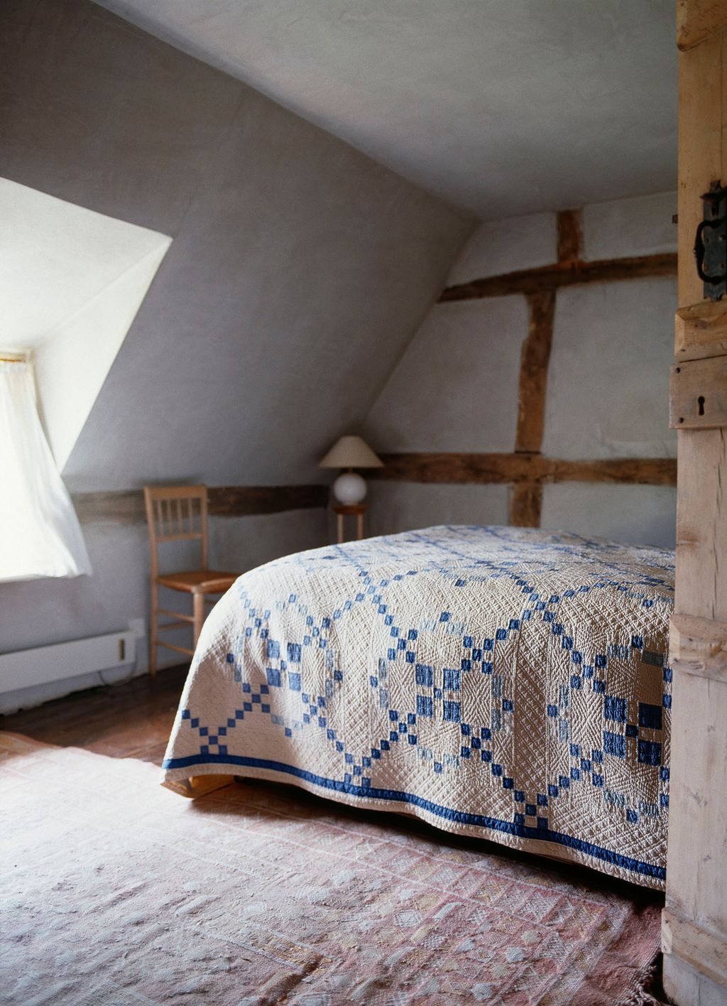 Image may contain Housing Building Loft Furniture Indoors Attic Interior Design Home Decor and Bed