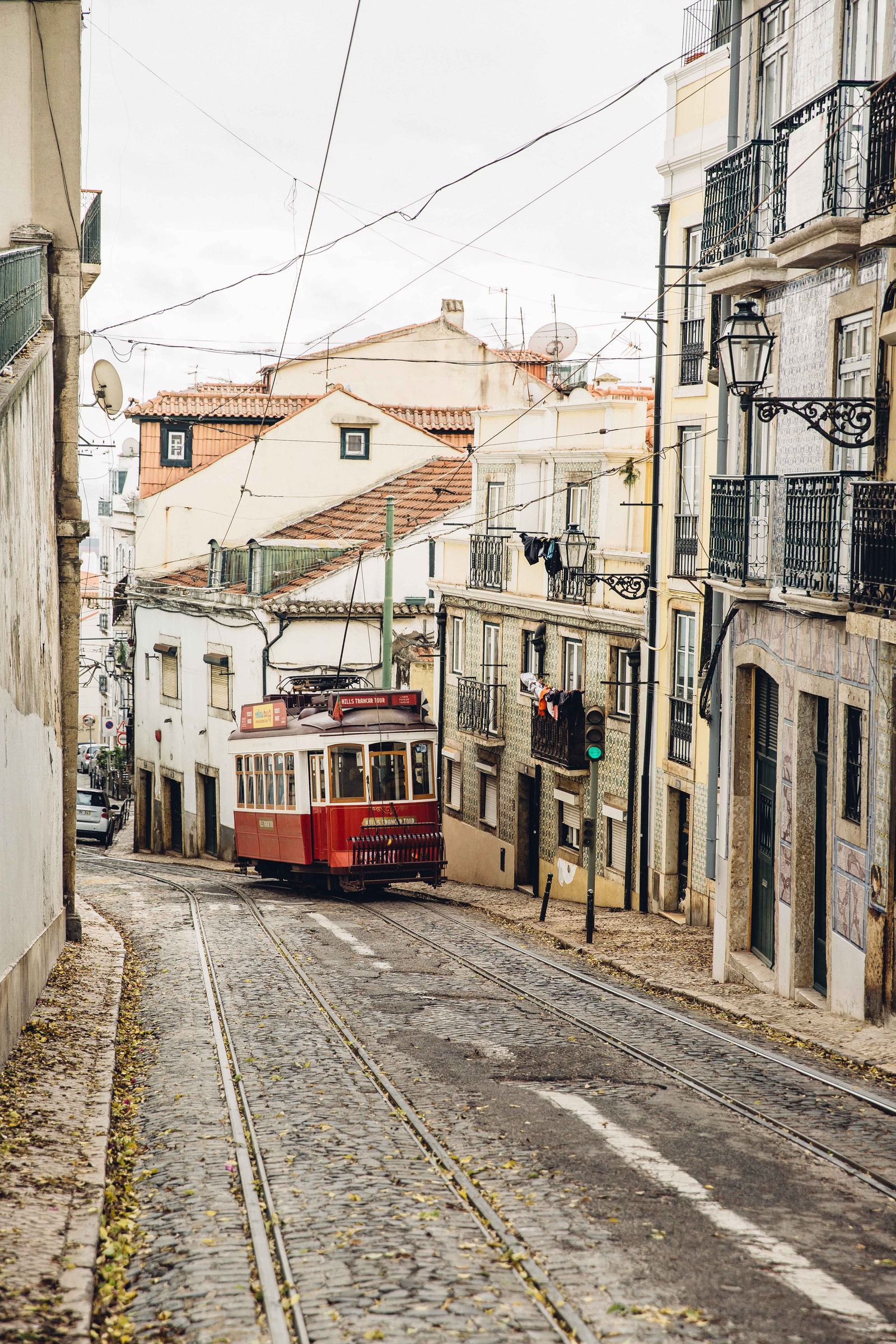 Image may contain Vehicle Transportation Train Cable Car Light Traffic Light Trolley Tram Streetcar City and Town