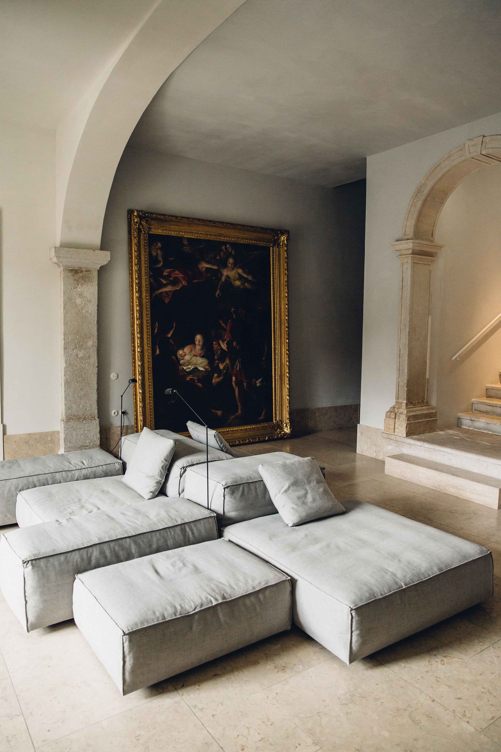 Image may contain Furniture Flooring Couch Floor Living Room Indoors Room Interior Design and Wood