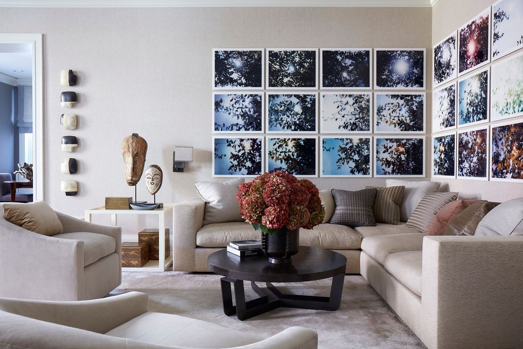 Image may contain Furniture Living Room Indoors Room Table Coffee Table Couch Cushion Rug and Pillow