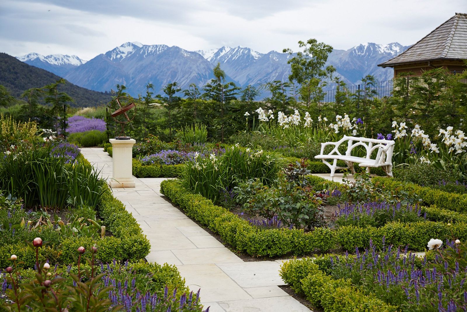 Image may contain Grass Plant Outdoors Garden Furniture Bench Park Lawn and Arbour