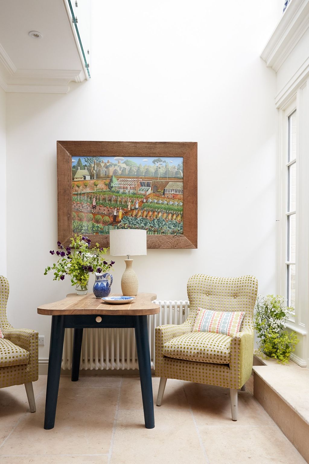 Image may contain Furniture Chair Table Living Room Room Indoors Interior Design Home Decor and Coffee Table