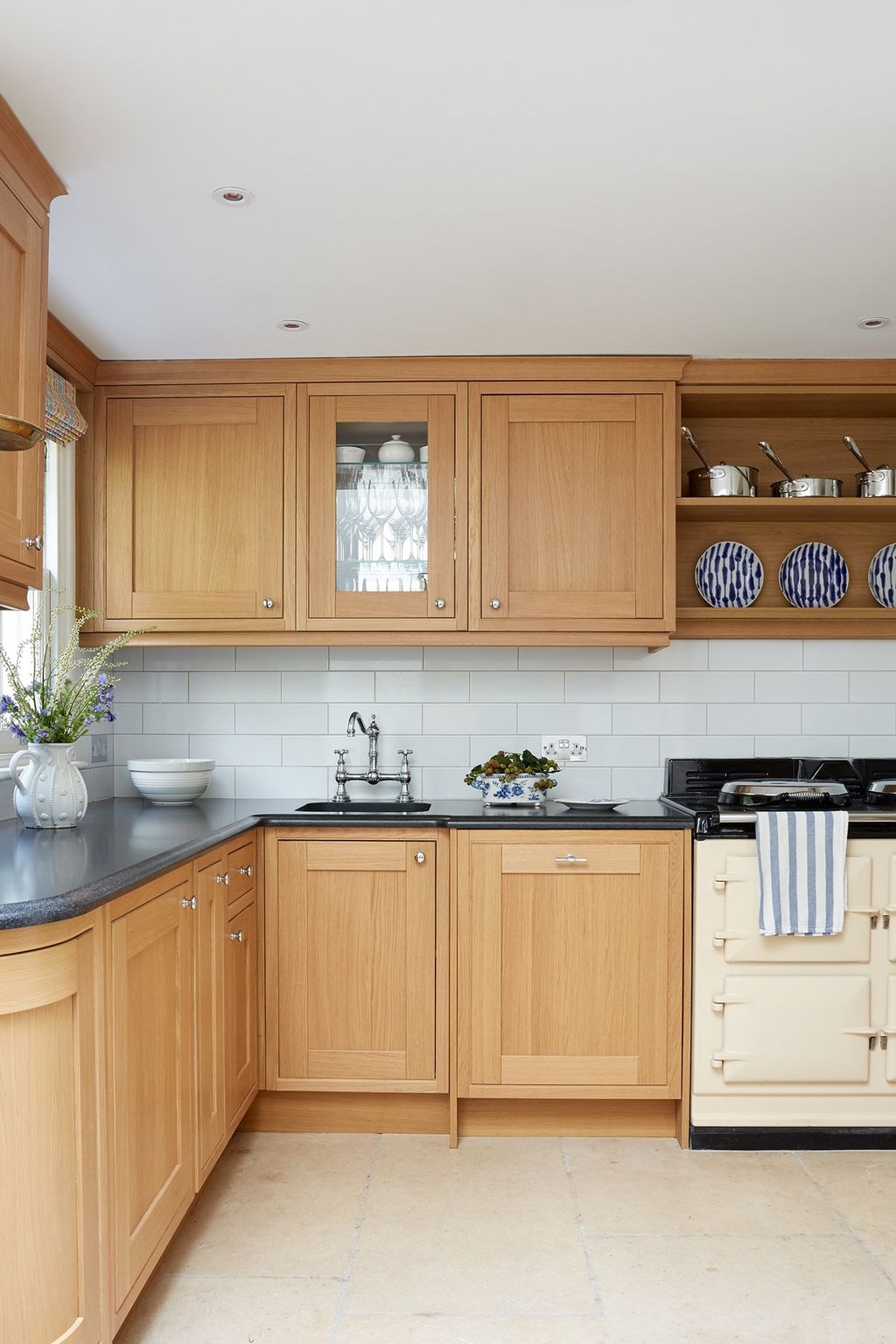 Image may contain Indoors Room Furniture Kitchen Cabinet and Interior Design