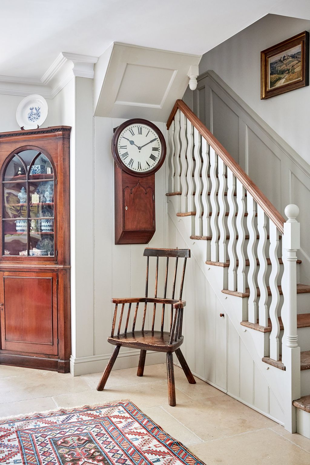 Stairs lead down to the kitchen and dining room.