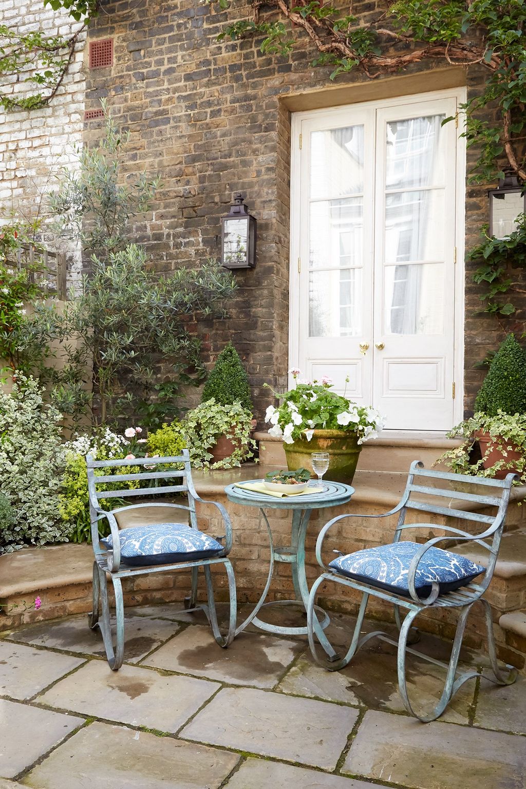 Image may contain Furniture Chair Patio and Table