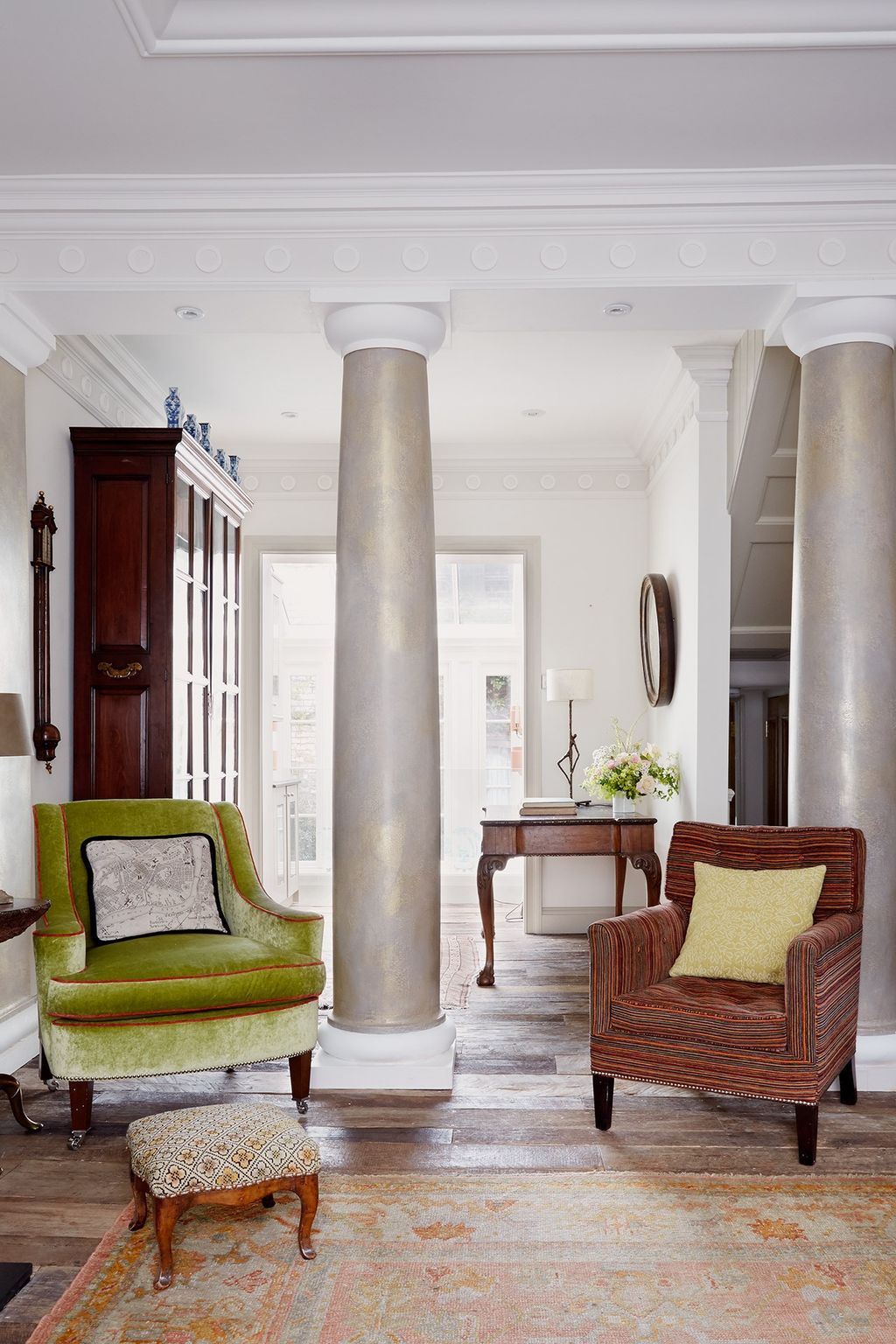 Image may contain Architecture Building Furniture Couch Column Pillar Interior Design Indoors and Home Decor