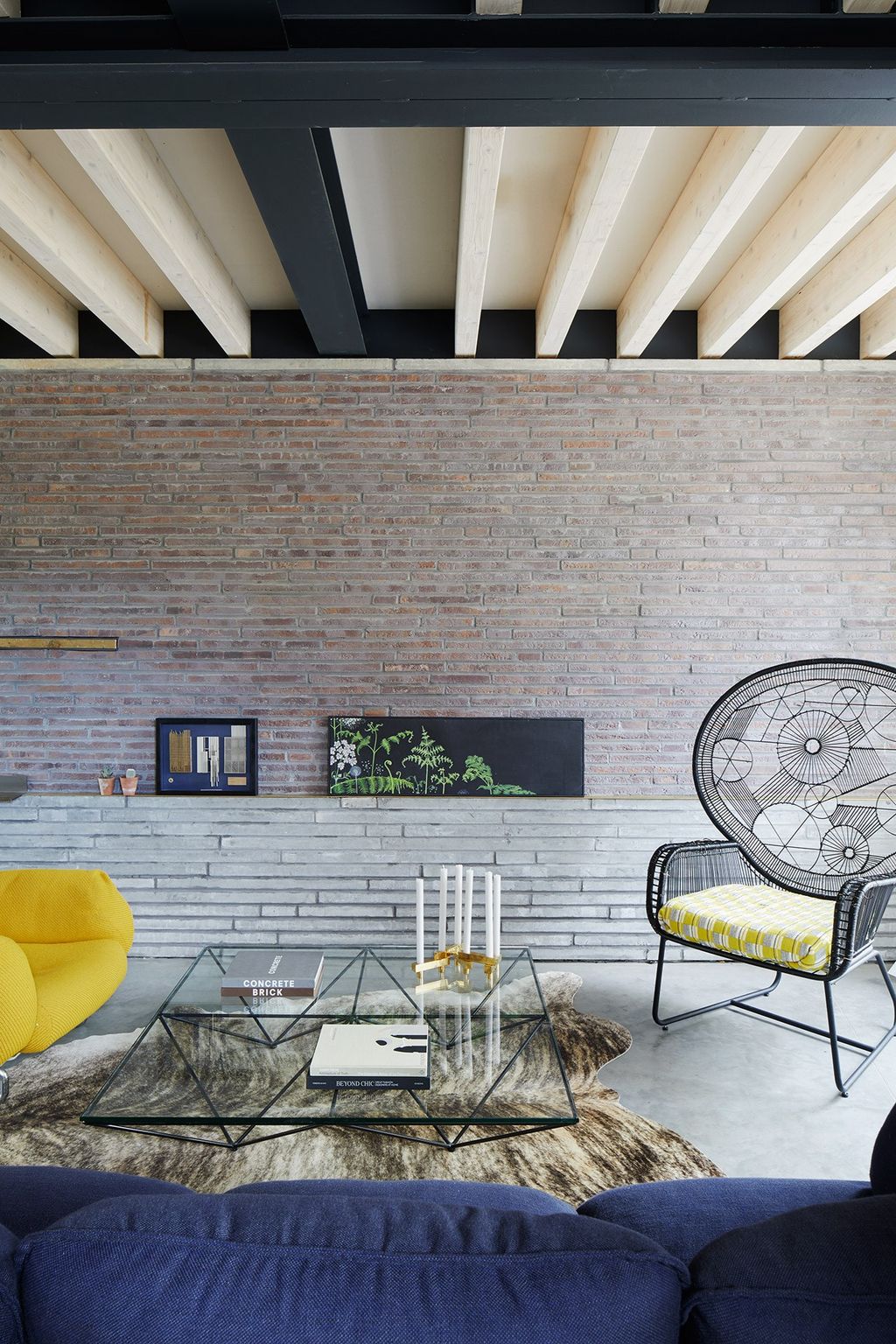 Image may contain Furniture Chair Indoors Living Room Room Interior Design Couch Table Housing and Building