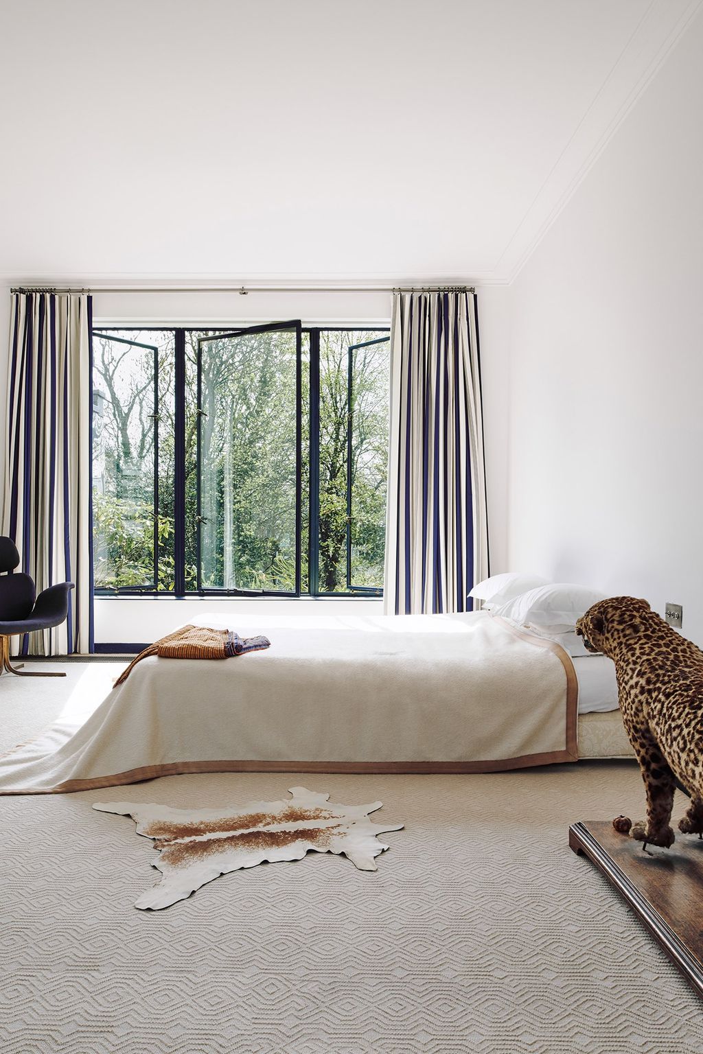 Image may contain Room Bedroom Indoors and Rug