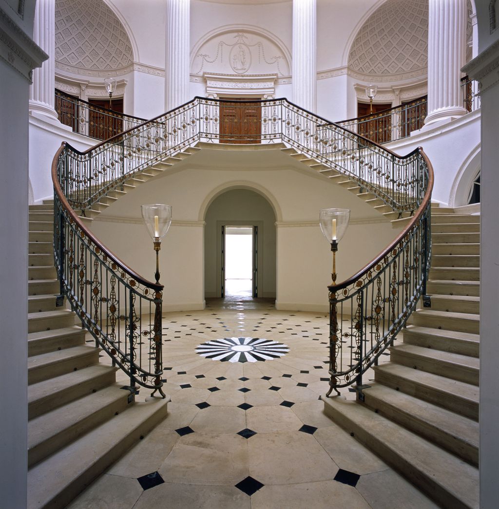 Staircase Hall ground floor with rare shaded candle lights on the newel posts.