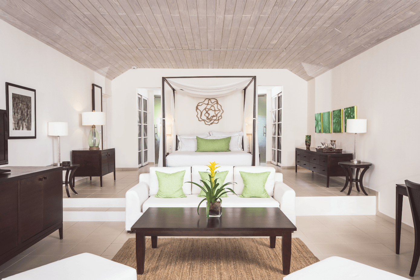 Image may contain Furniture Table Living Room Room Indoors Coffee Table Interior Design Lobby and Rug