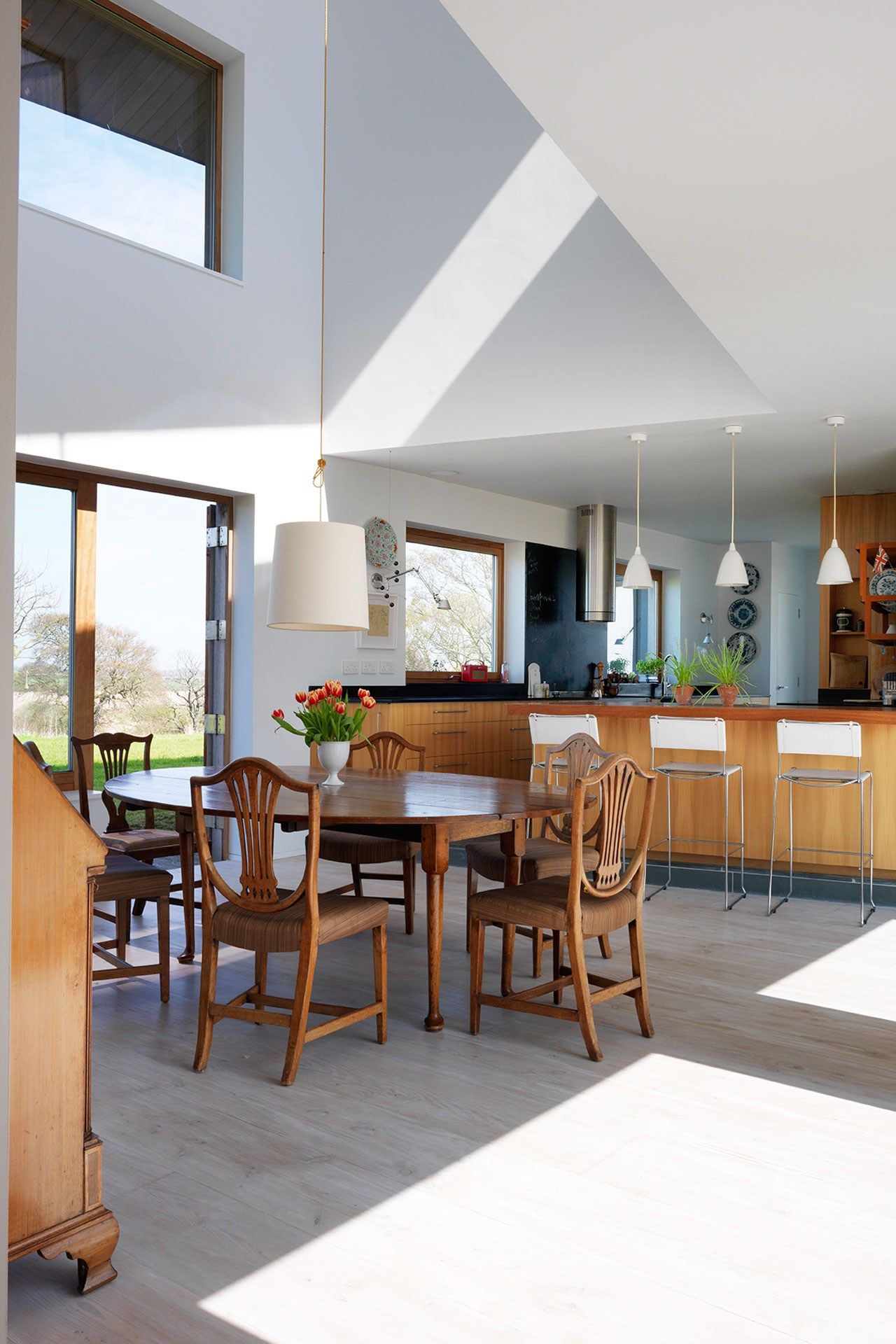 Image may contain Furniture Chair Room Indoors Dining Table Table Interior Design and Dining Room