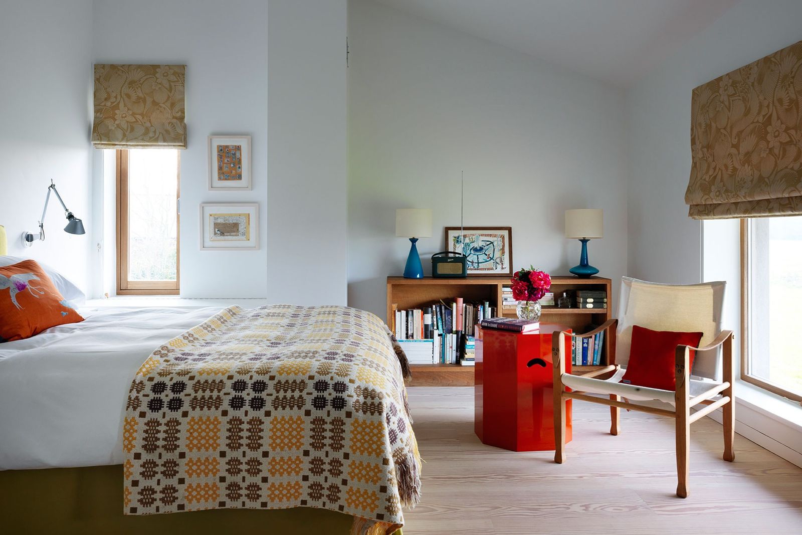 Image may contain Furniture Flooring Room Bedroom Indoors Interior Design Floor Living Room Wood and Hardwood