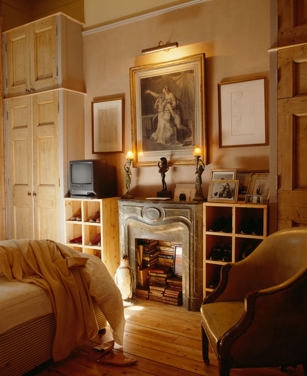 Image may contain Furniture Chair Living Room Indoors Room Wood Interior Design Shelf Hardwood and Flooring