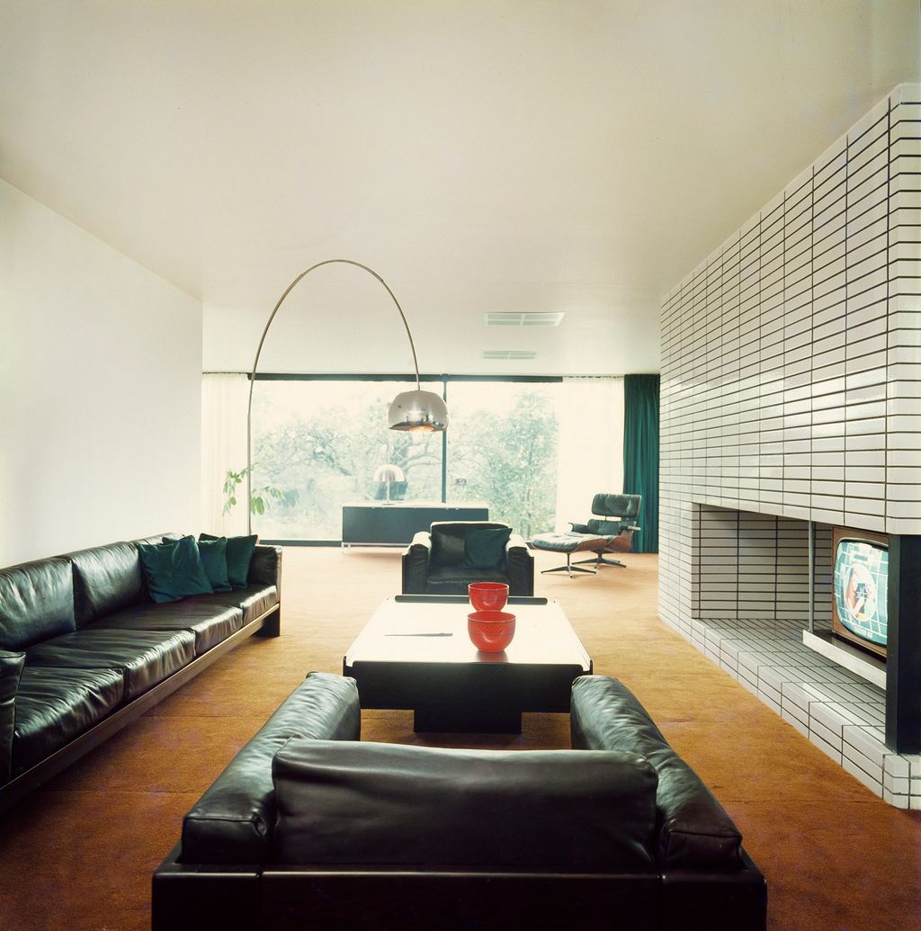 Image may contain Living Room Room Indoors Furniture Couch Interior Design Waiting Room Chair and Lobby