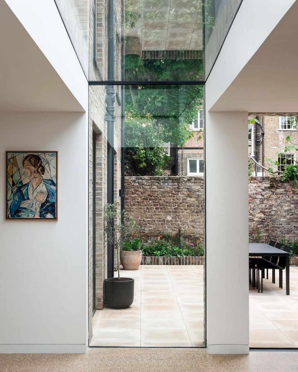 Image may contain Flooring Human Person Floor Patio Interior Design Indoors Corridor and Door