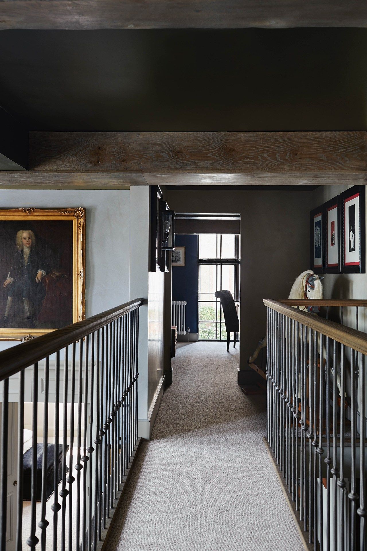 Image may contain Banister Handrail Railing Interior Design Indoors Flooring Human Person Corridor and Floor