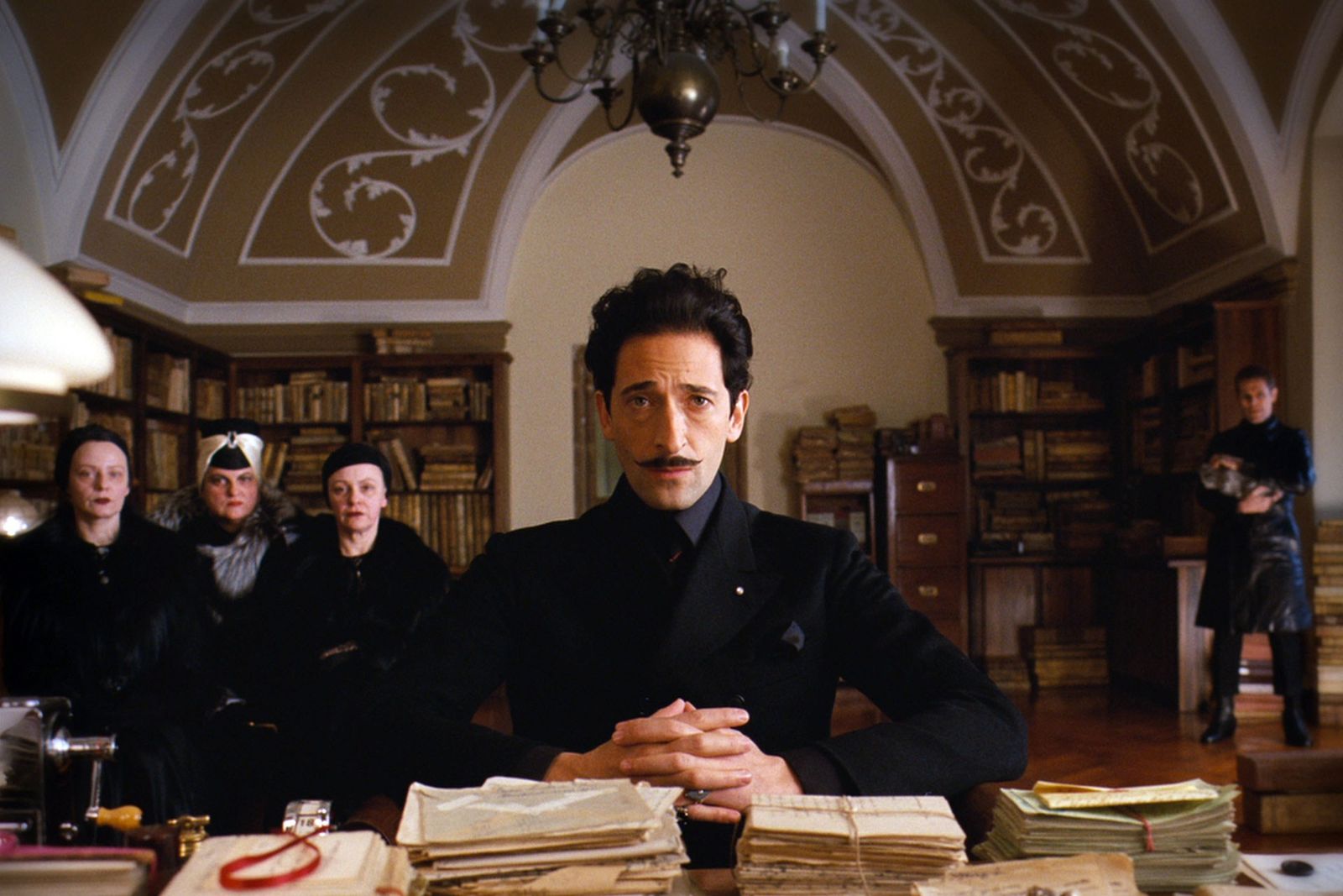 Image may contain Adrien Brody Human Person Furniture Table Sandra Birdsell Pub Bar Counter Indoors and Room