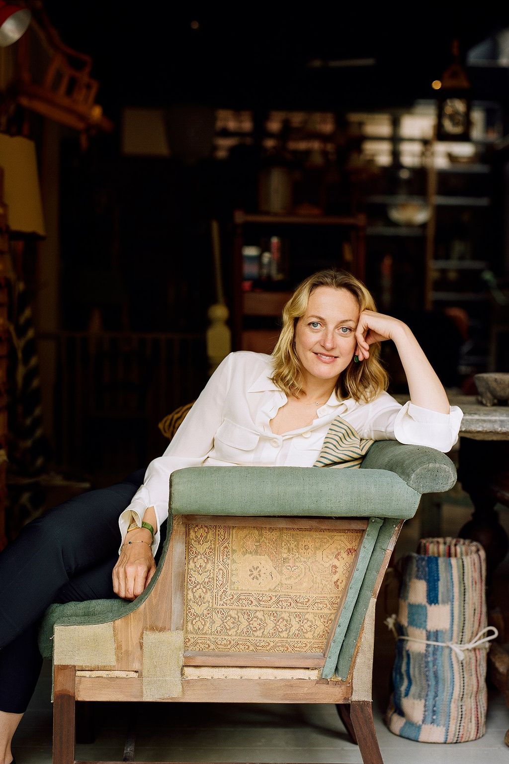 Image may contain Furniture Human Person Wood Shelf Clothing Apparel and Hardwood