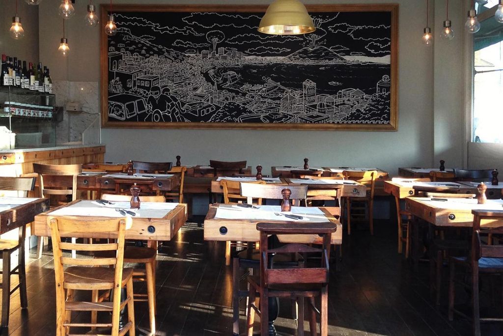 Image may contain Wood Furniture Chair Plywood Hardwood and Restaurant