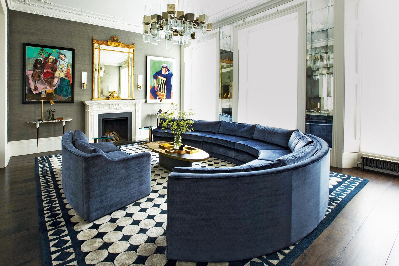 Image may contain Furniture Living Room Room Indoors Couch Rug and Lobby