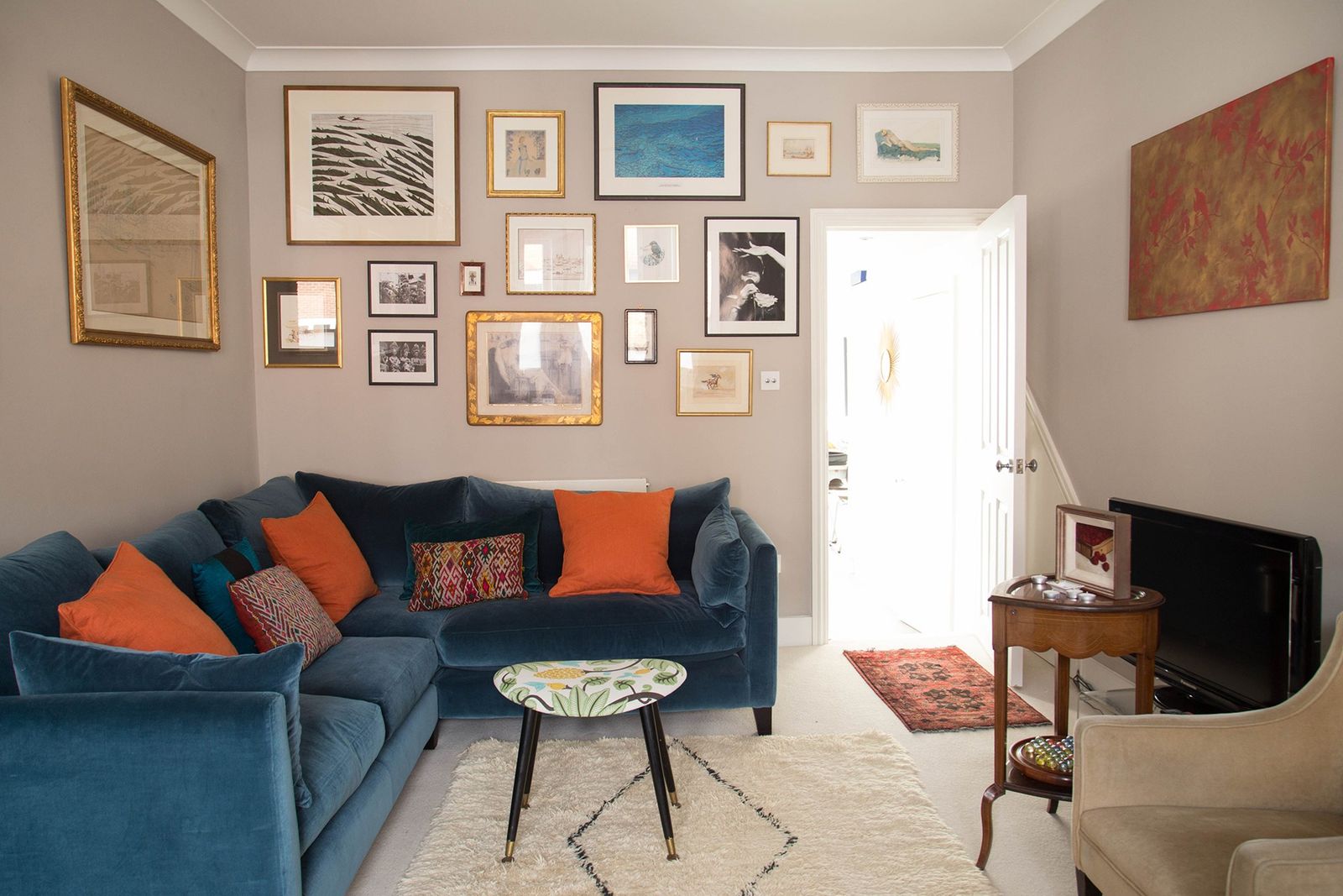 Image may contain Furniture Living Room Indoors Room Couch Table and Coffee Table