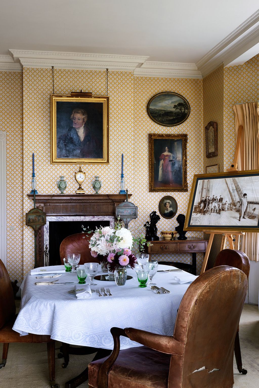 Image may contain Furniture Chair Home Decor Living Room Indoors Room Interior Design Plant Human and Person