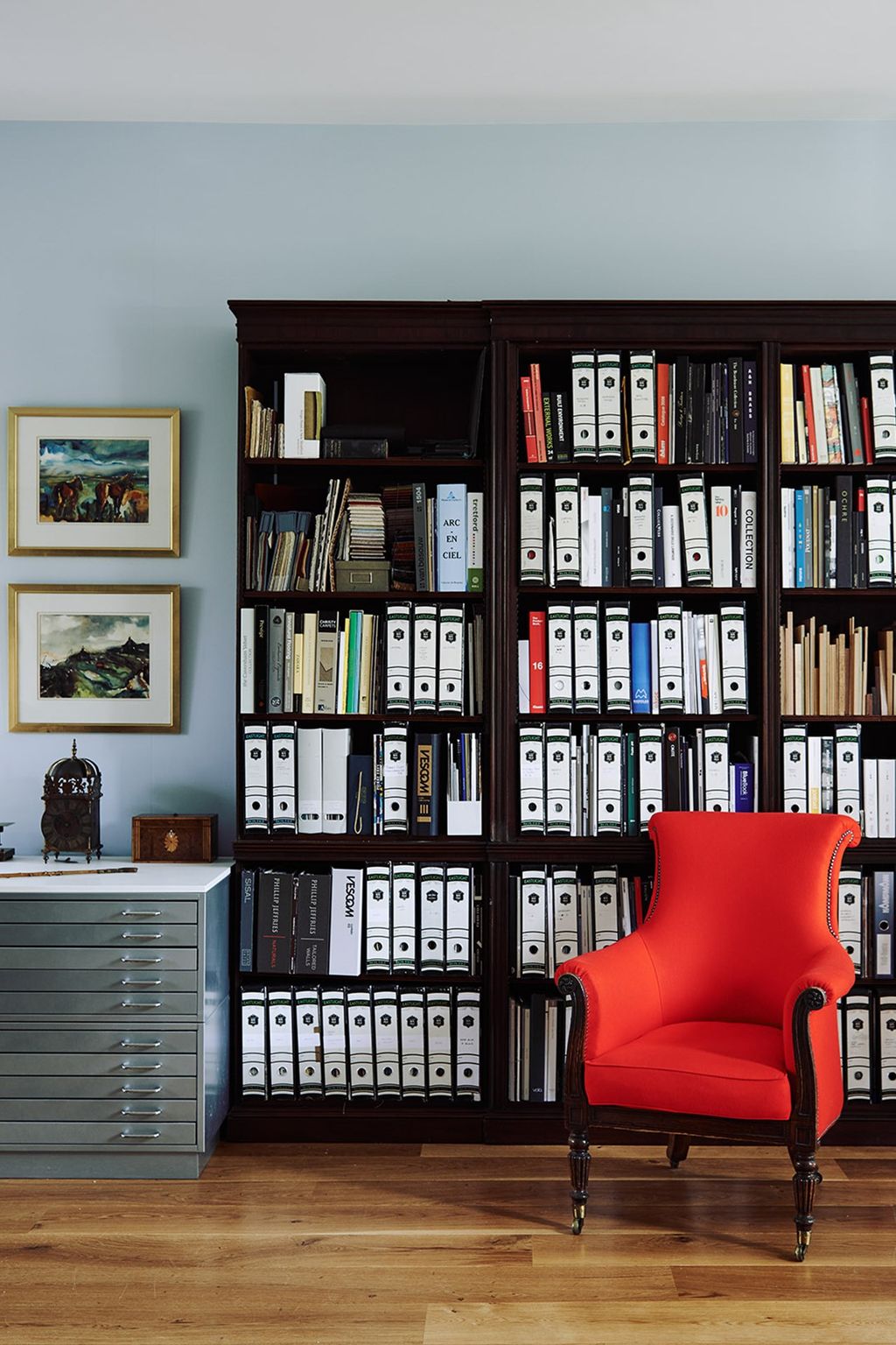 Image may contain Furniture Chair Bookcase Shelf Indoors and Room