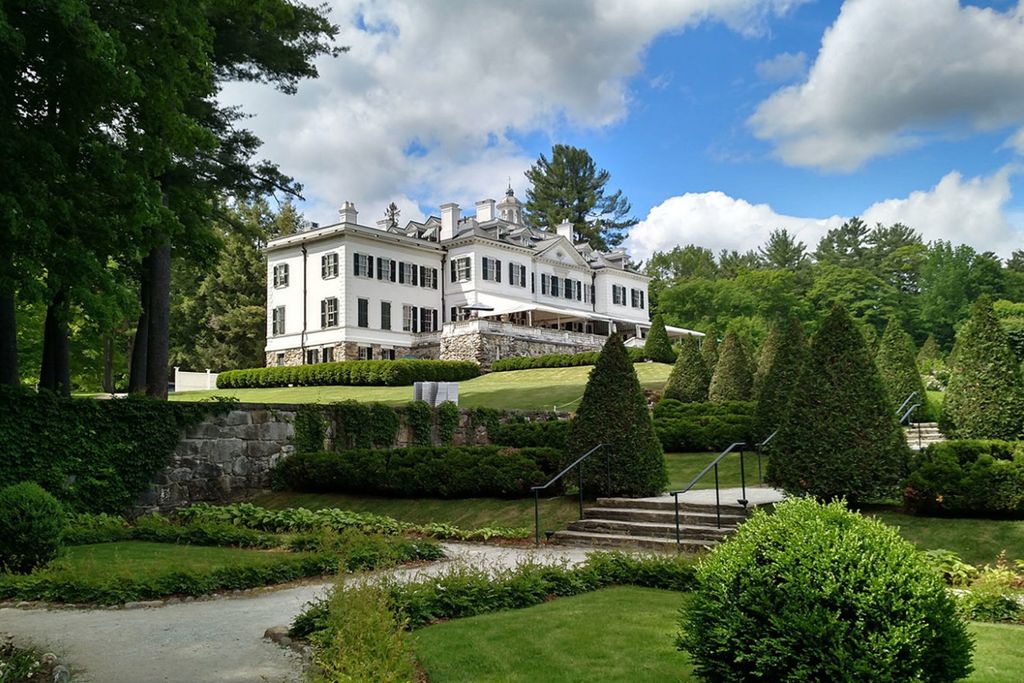 Image may contain Grass Plant Outdoors Tree Hedge Fence and Lawn