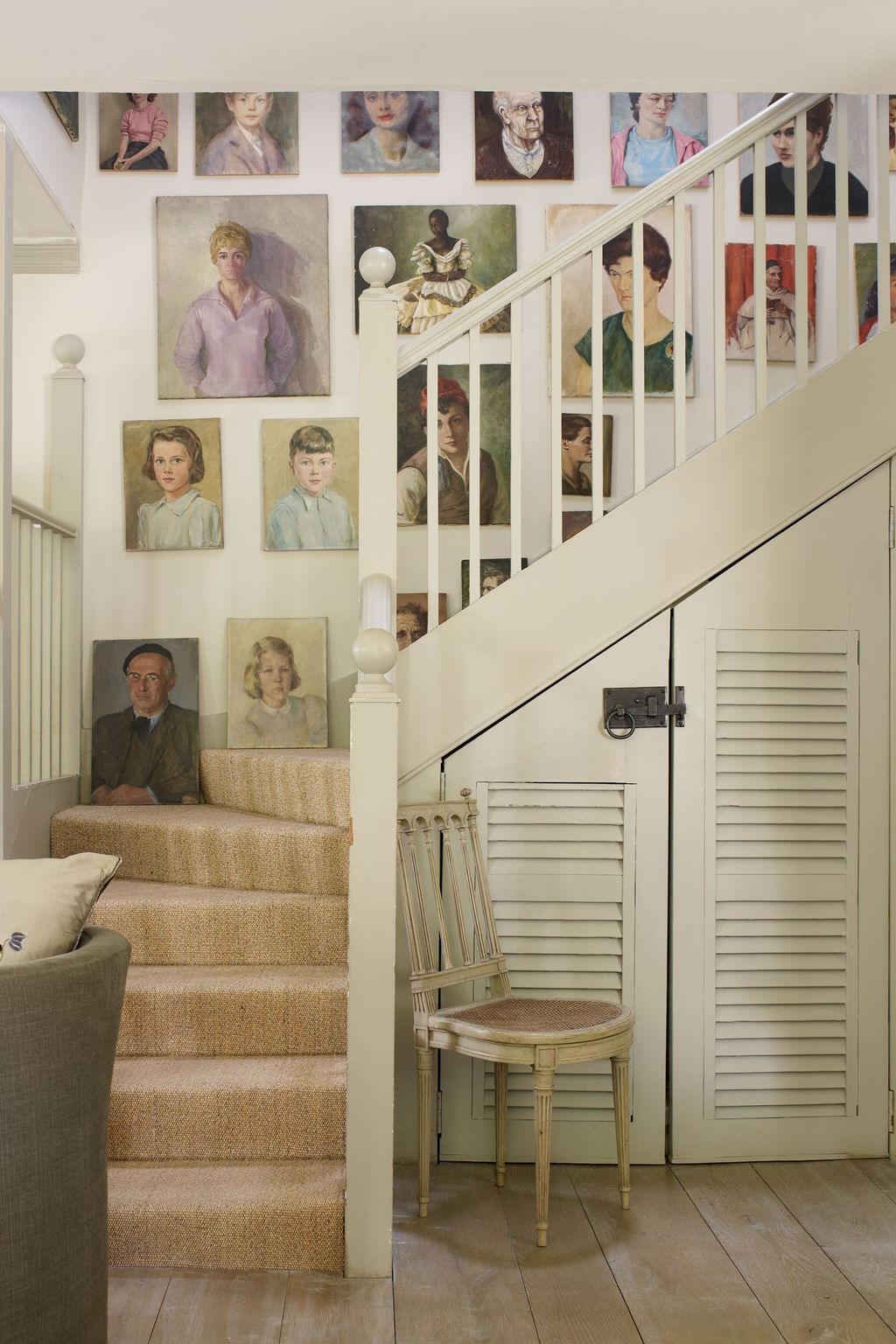 Unframed 40s 50s portraiture staircase gallery wall  Hanging Pictures Creative Ideas for Decoration