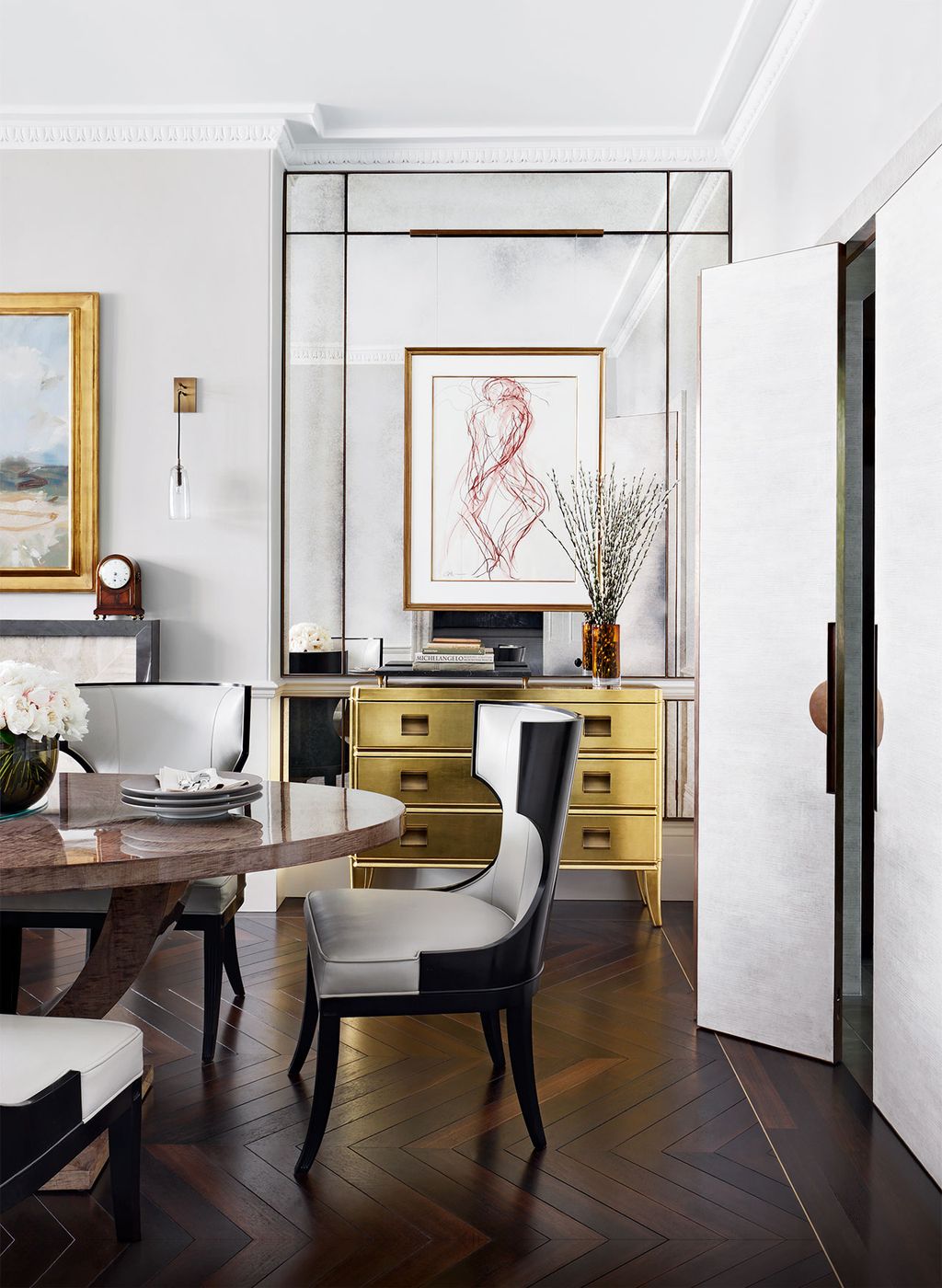 Image may contain Furniture Chair Interior Design Indoors Room Table Vase Pottery Jar Plant and Dining Table