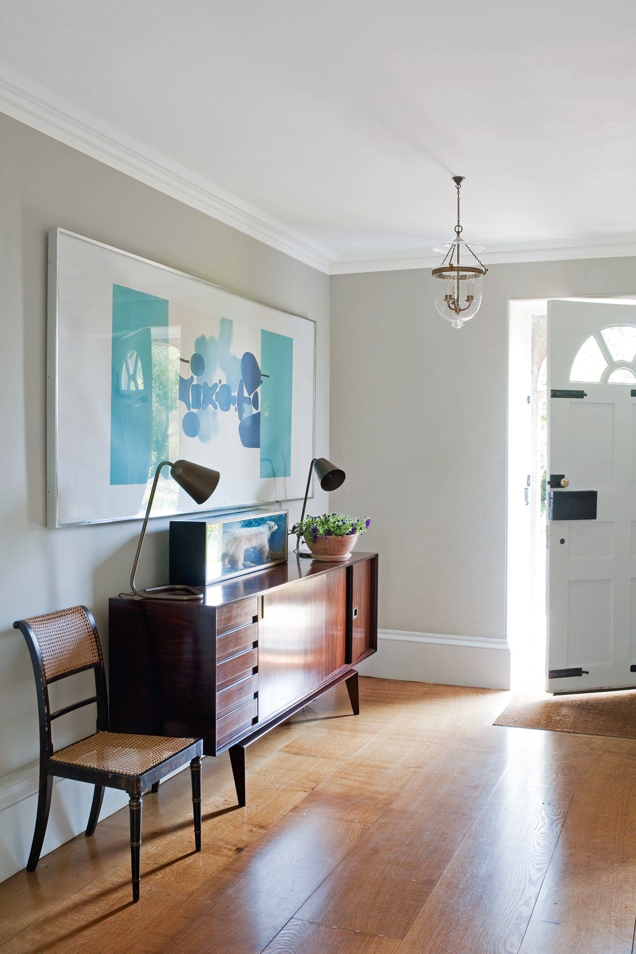 Image may contain Furniture Chair Wood Flooring Floor Hardwood Corner Sideboard Table Interior Design and Indoors