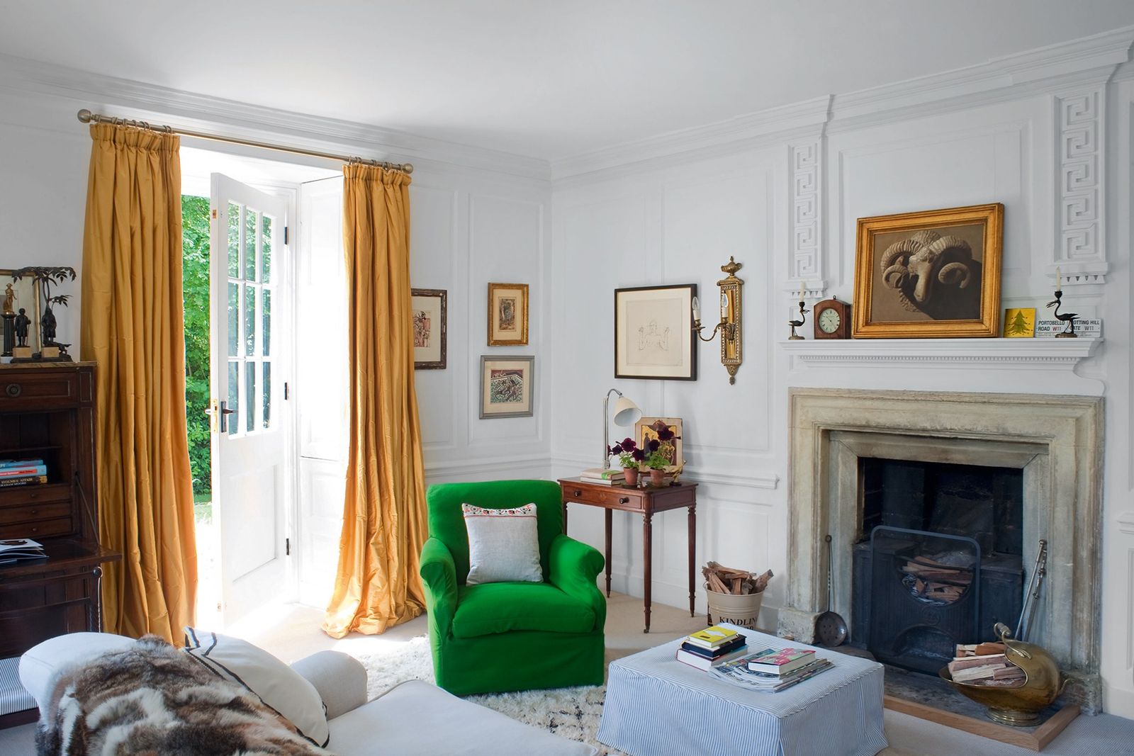 Image may contain Furniture Living Room Indoors Room Couch and Fireplace