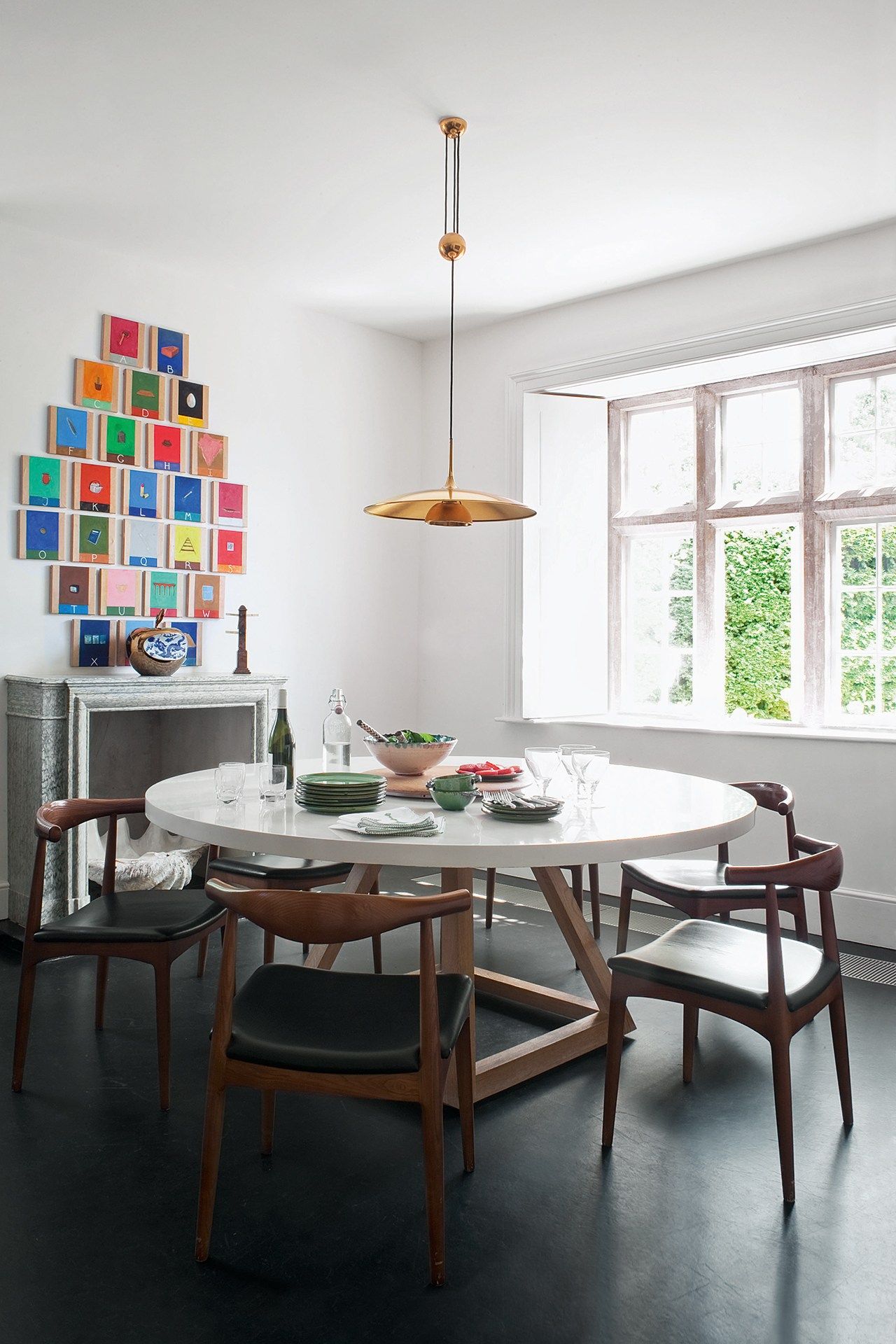 Image may contain Furniture Chair Indoors Room Dining Room Table and Dining Table