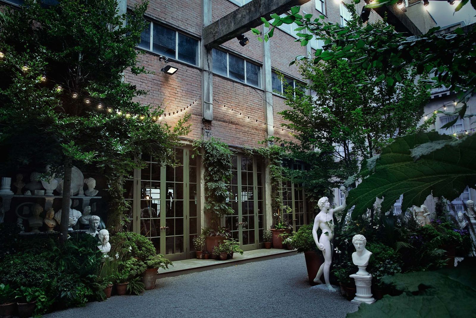 Image may contain Praxiteles Augustus Tree Plant Human Person Flagstone Slate Home Decor City Town and High Rise