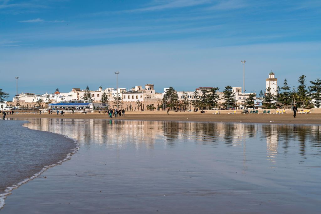 Image may contain Human Person Water Waterfront Outdoors Building Nature and Architecture