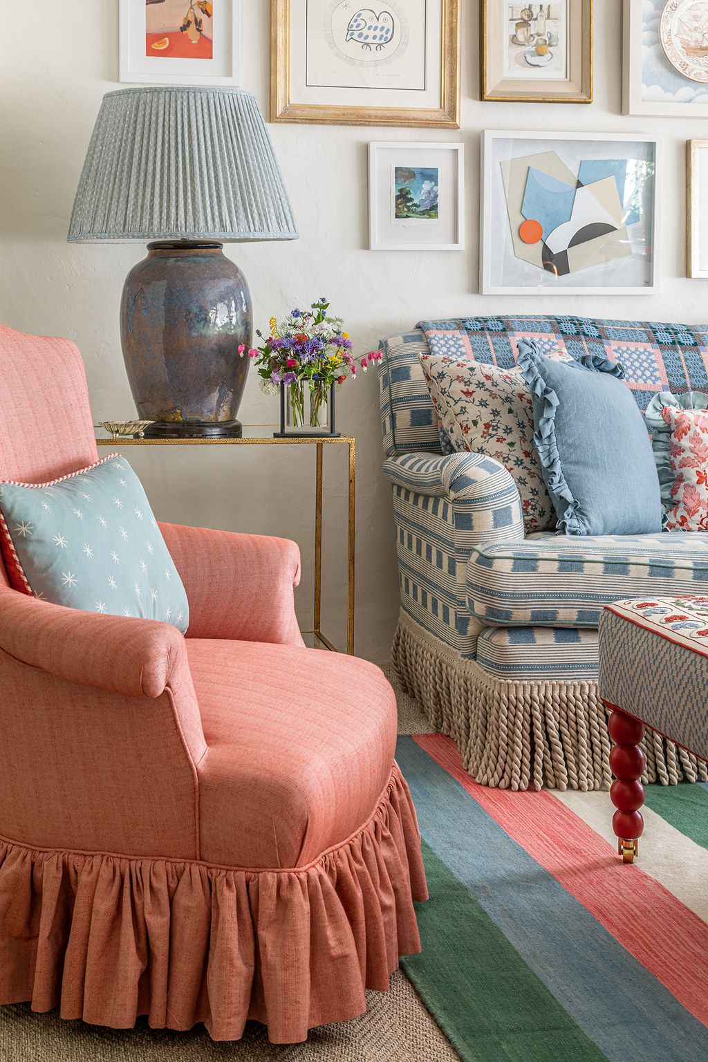 Image may contain Furniture Living Room Indoors Room Lamp Couch and Interior Design