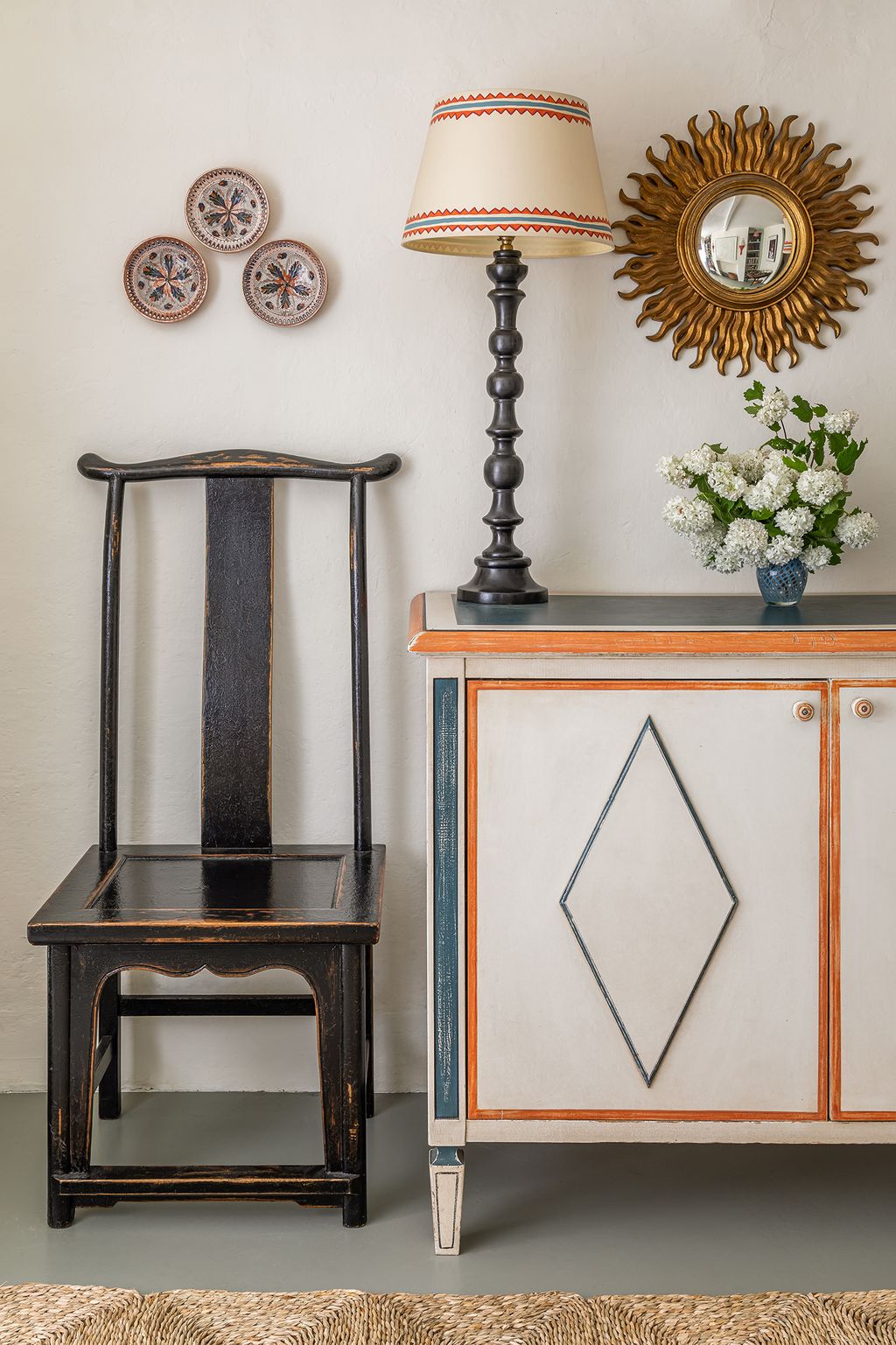 Image may contain Furniture Interior Design Indoors Home Decor Lamp Sideboard Corner Cupboard and Closet